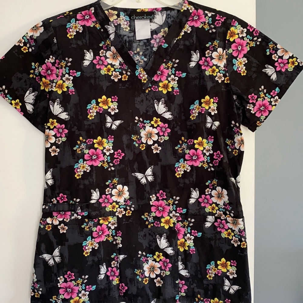 Black scrub top with flowers and butterflies